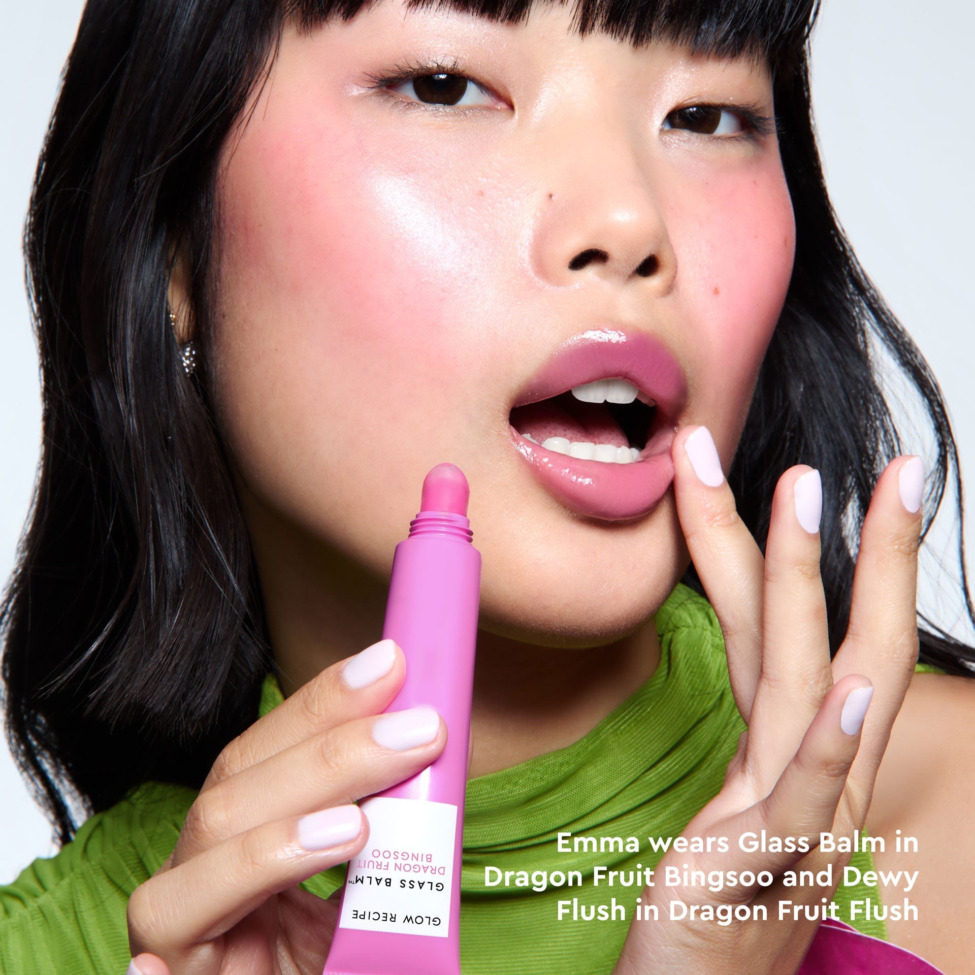 Third model close-up wearing Glass Balm in Dragon Fruit Bingsoo, showing the sheer bright-pink lip tint.