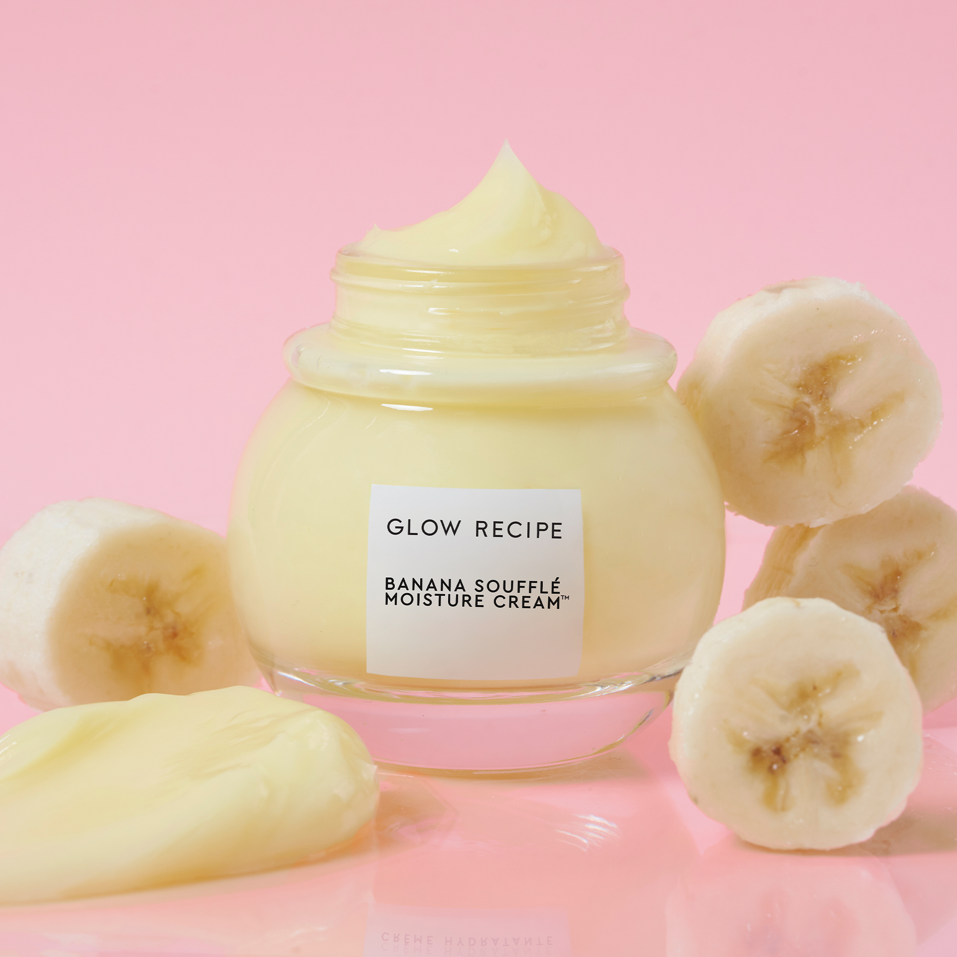 Glow Recipe Banana Souffle Moisture Cream shown alongside its banana-scented lip launch companion product.