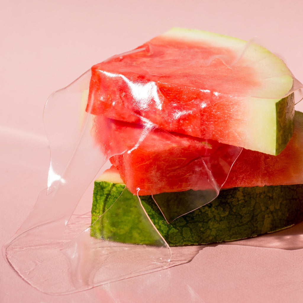 Watermelon Glow Jelly Sheet Mask packet shown alongside its individually wrapped two-piece mask.