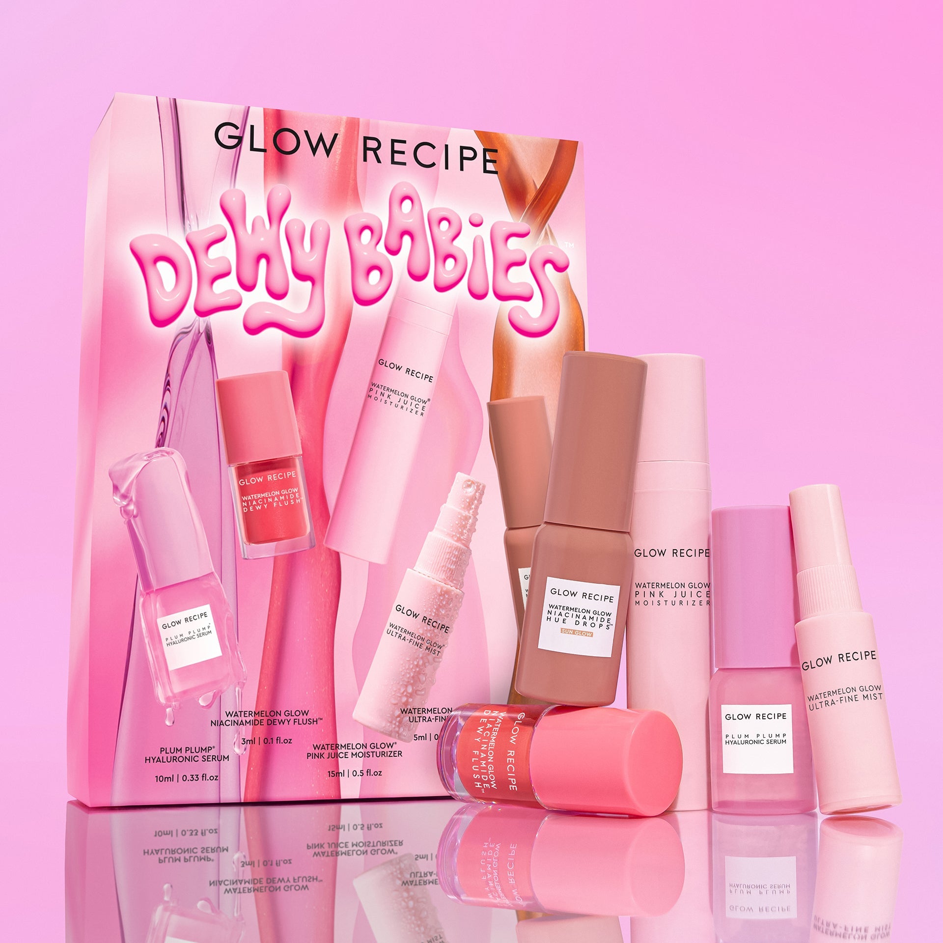 Glow Recipe Dewey Babies beauty product set with packaging on a pink background