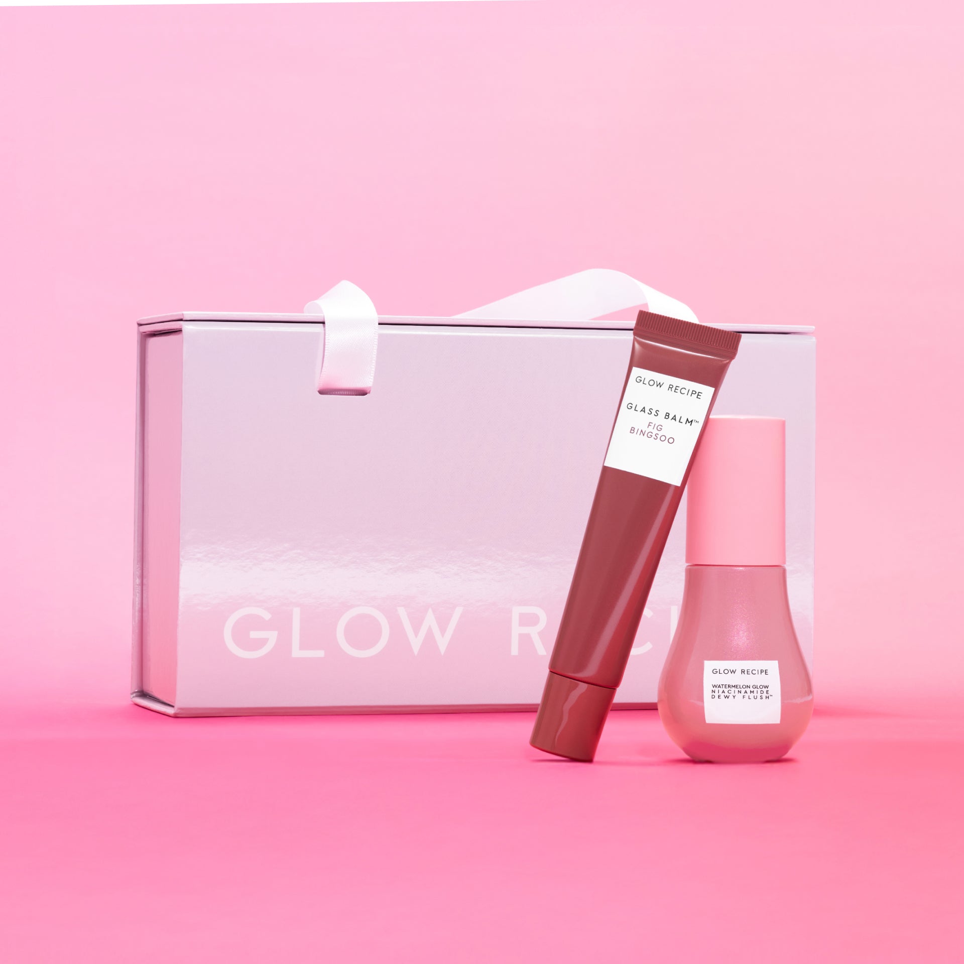 Fig + Watermelon Lip & Cheek Kit displayed in its iridescent keepsake box against a soft studio background.