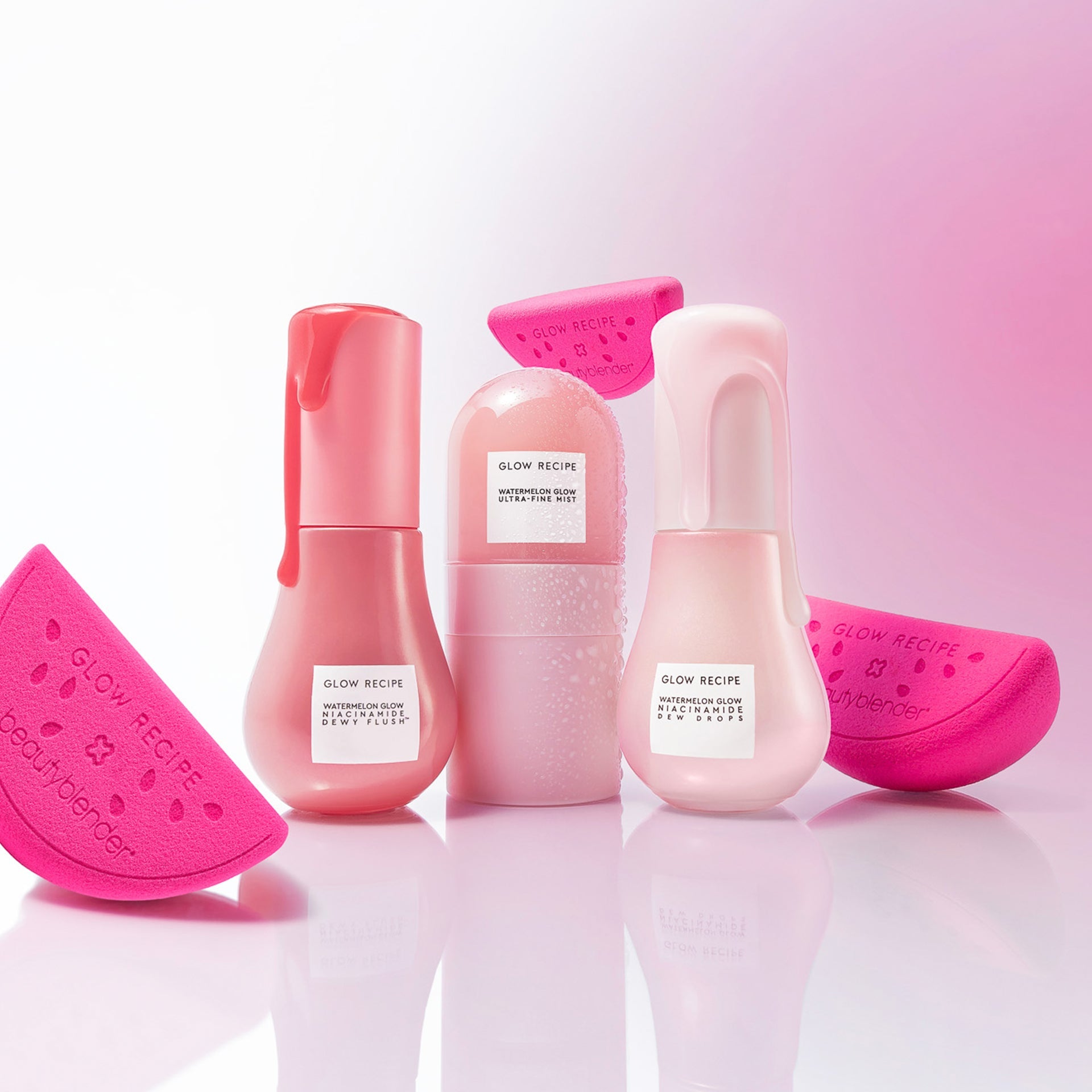 Glow Recipe Watermelon Glow Best-Sellers Kit flat lay of the Dew Drops, Dewy Flush, Mist, and Beautyblender together.