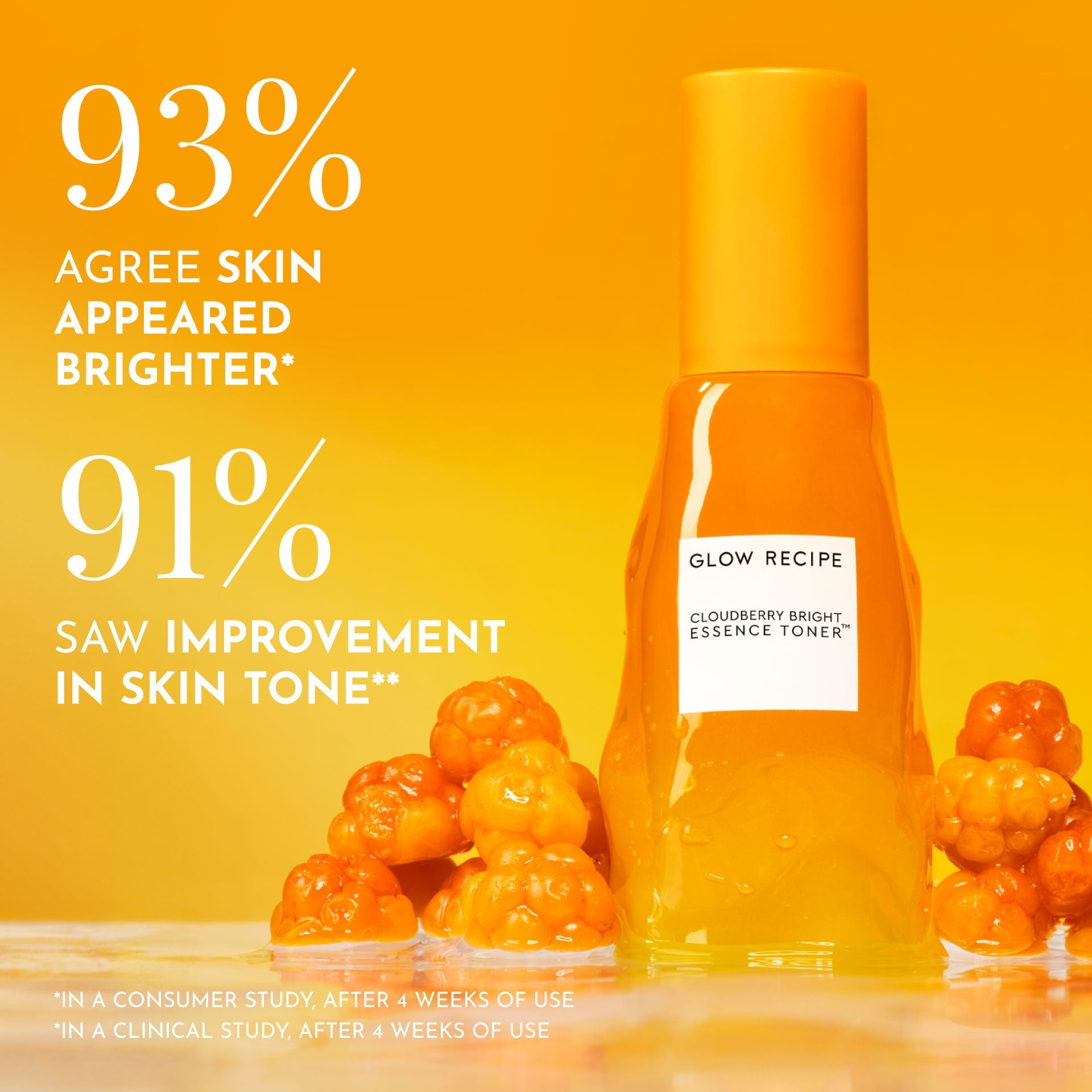 Full-Size (75ml) Cloudberry Bright Essence Toner bottle laid on its side beside cloudberries, the fruit behind its formula.