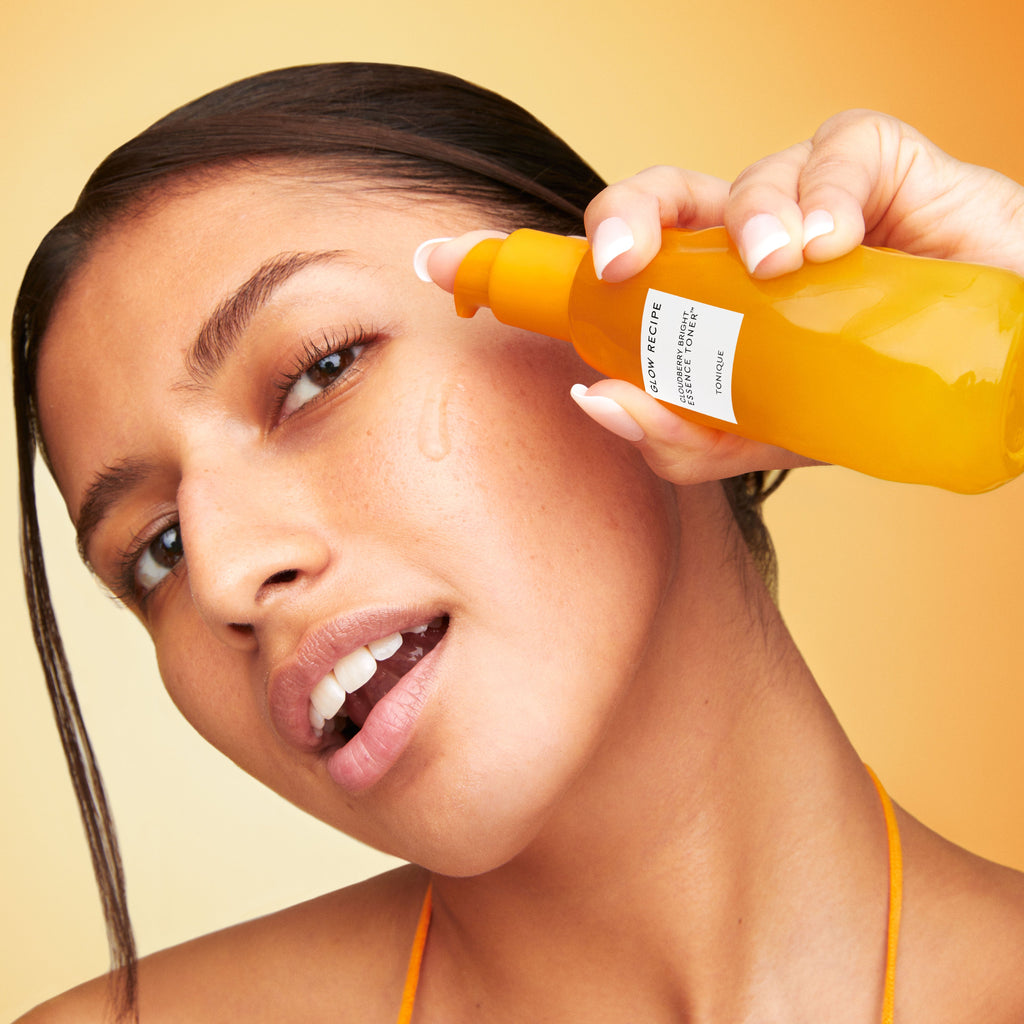 Full-Size (75ml) Cloudberry Bright Essence Toner captured at an angle to reveal the pump used to dispense the essence.