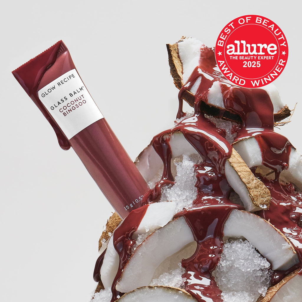 Allure Best of Beauty seal badge over the Glass Balm tube in Coconut Bingsoo, a sheer cool brown shade.