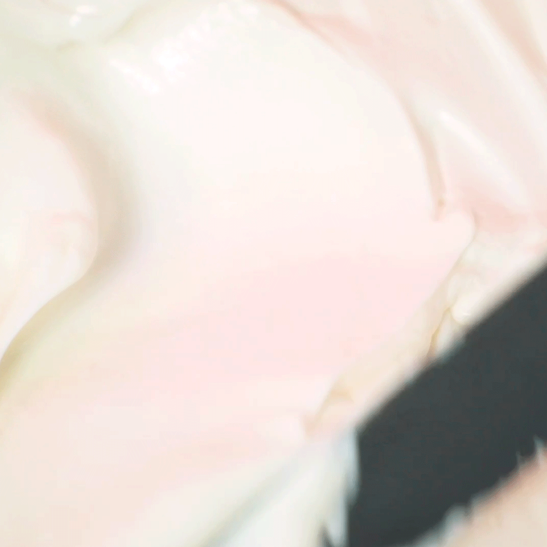 Animated close-up of Cloudberry Bright Refillable Moisture Cream's whipped, buttery texture melting into skin.