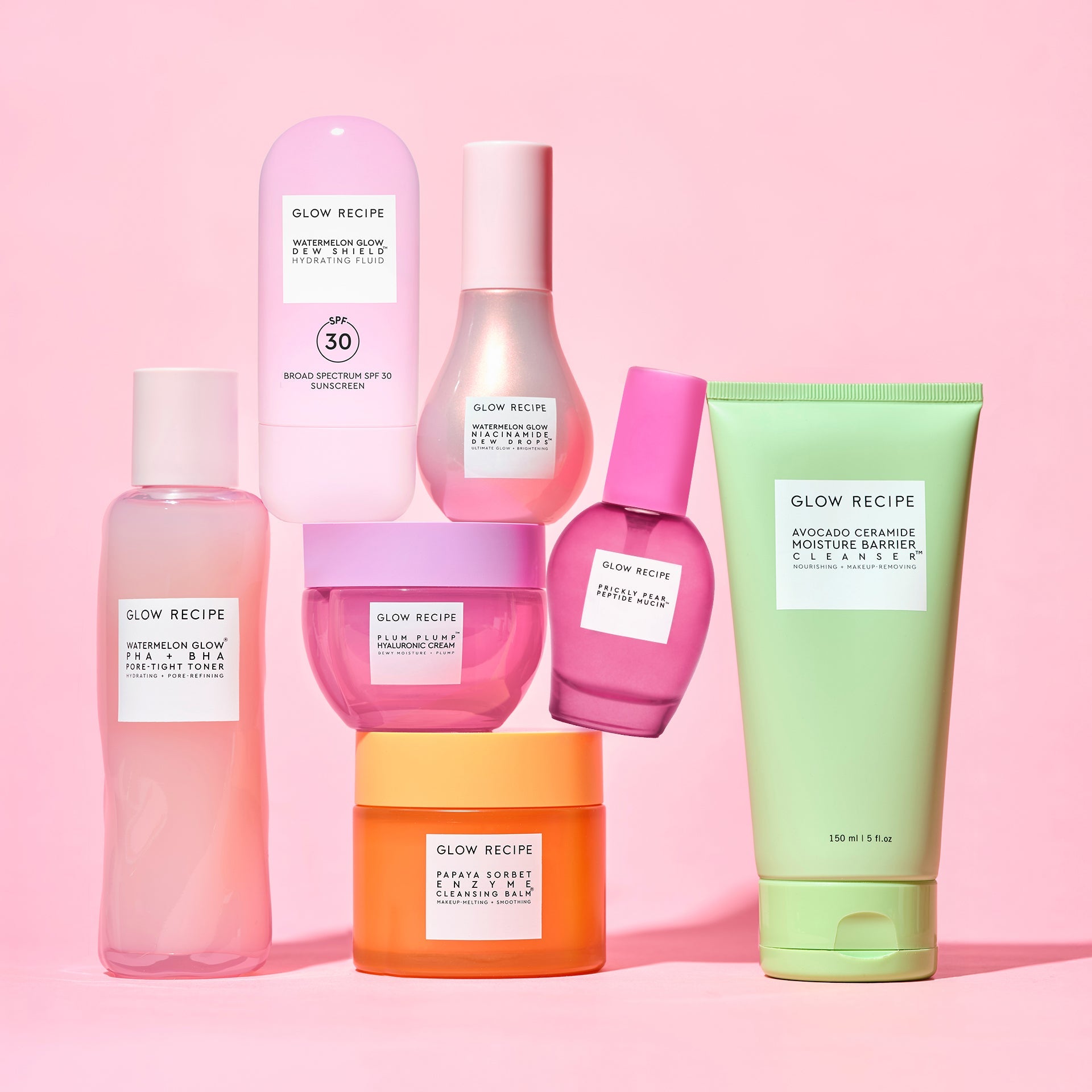 Set of Glow Recipe skincare products on a pink background