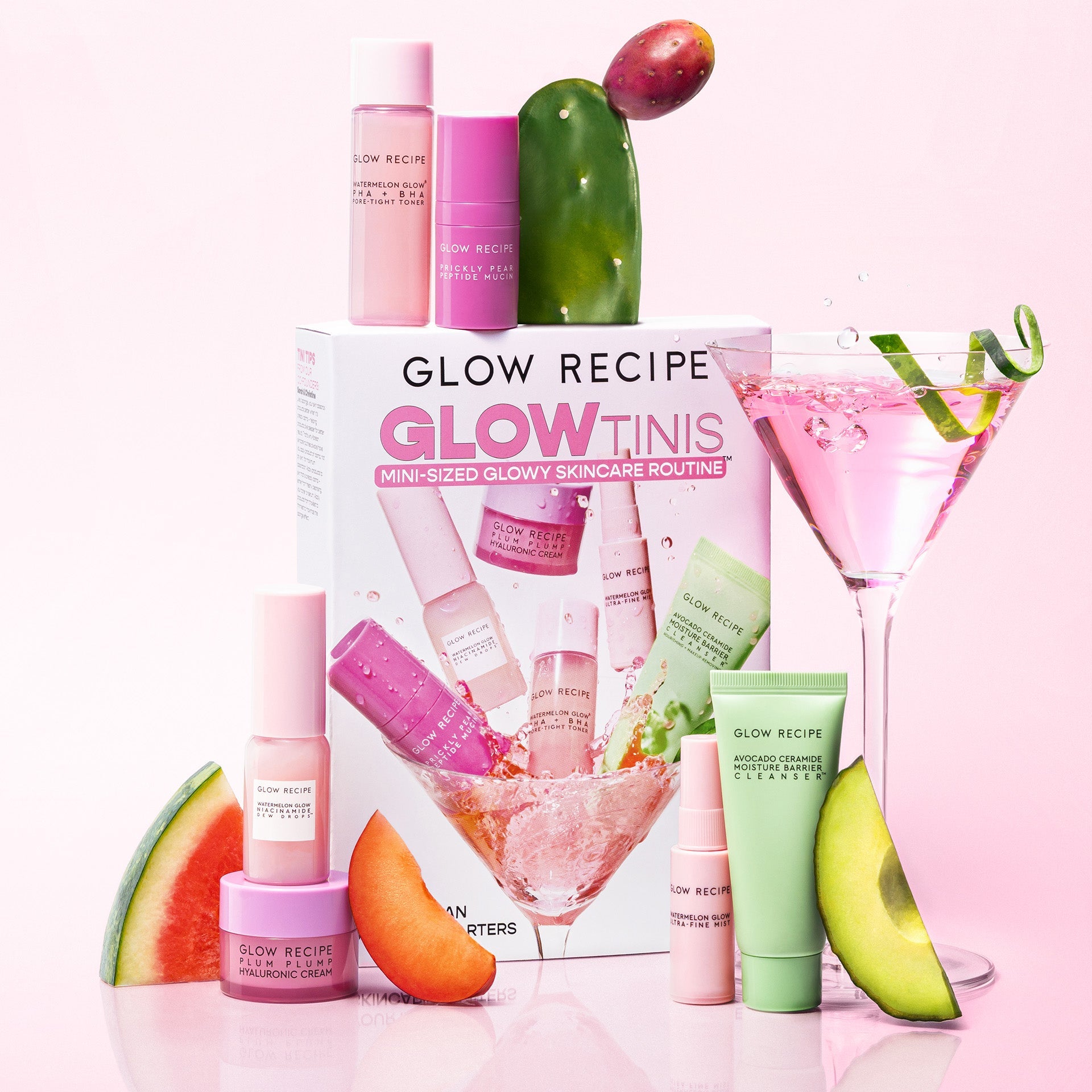 Glow Recipe GlowTinis 7-piece mini skincare set with travel-size cleanser, toner, serums, cream, and mist bottles.