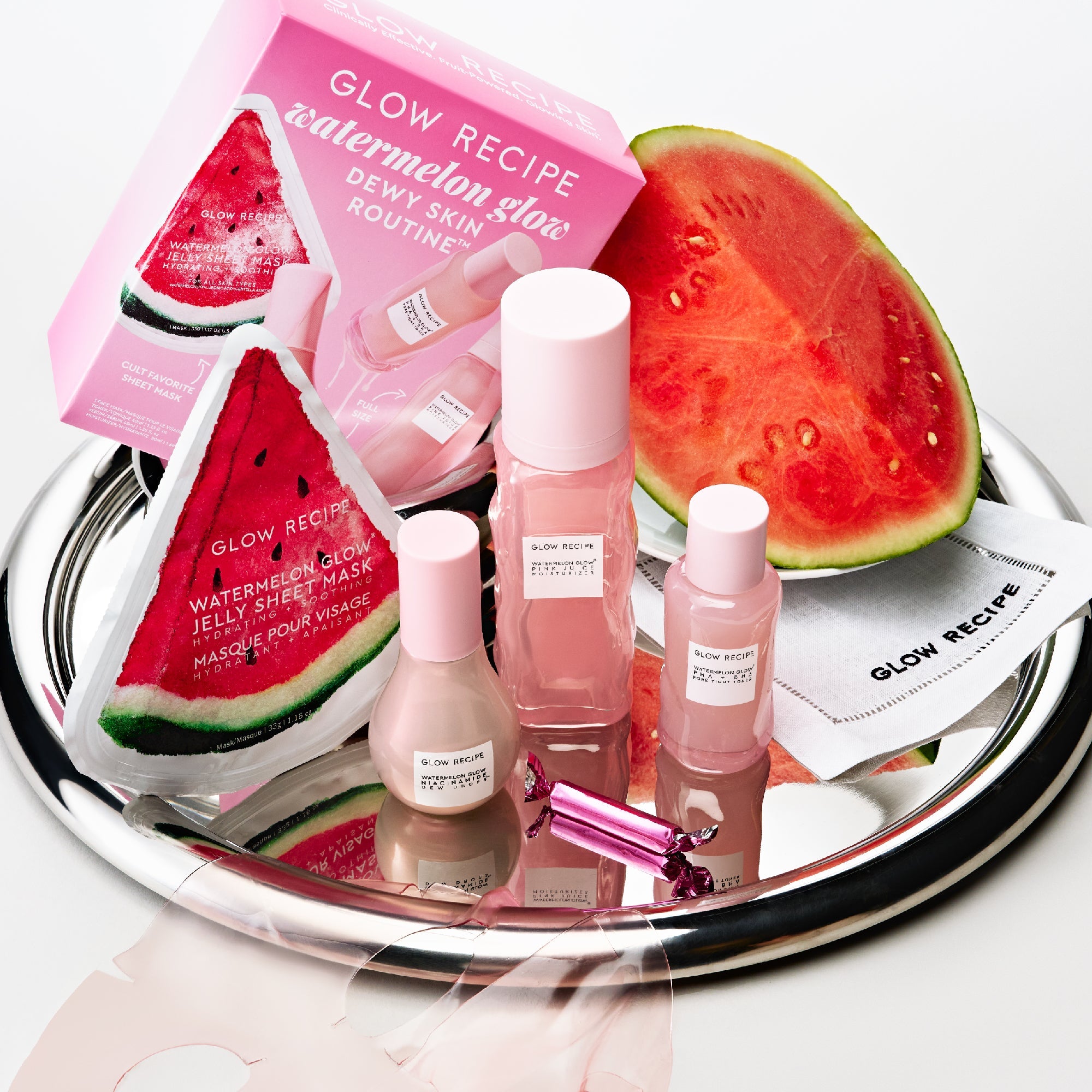 Glow Recipe skincare products with watermelon slices on a tray