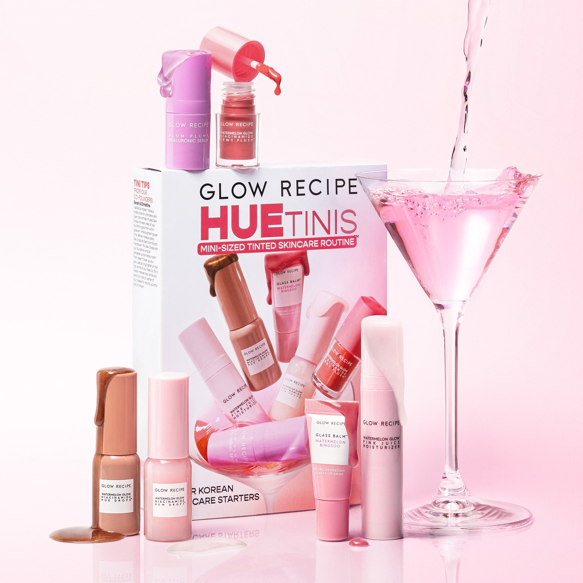 Glow Recipe HueTinis Mini Tinted Skincare Set arranged as a seven-piece travel tray of tinted, glow-boosting minis.