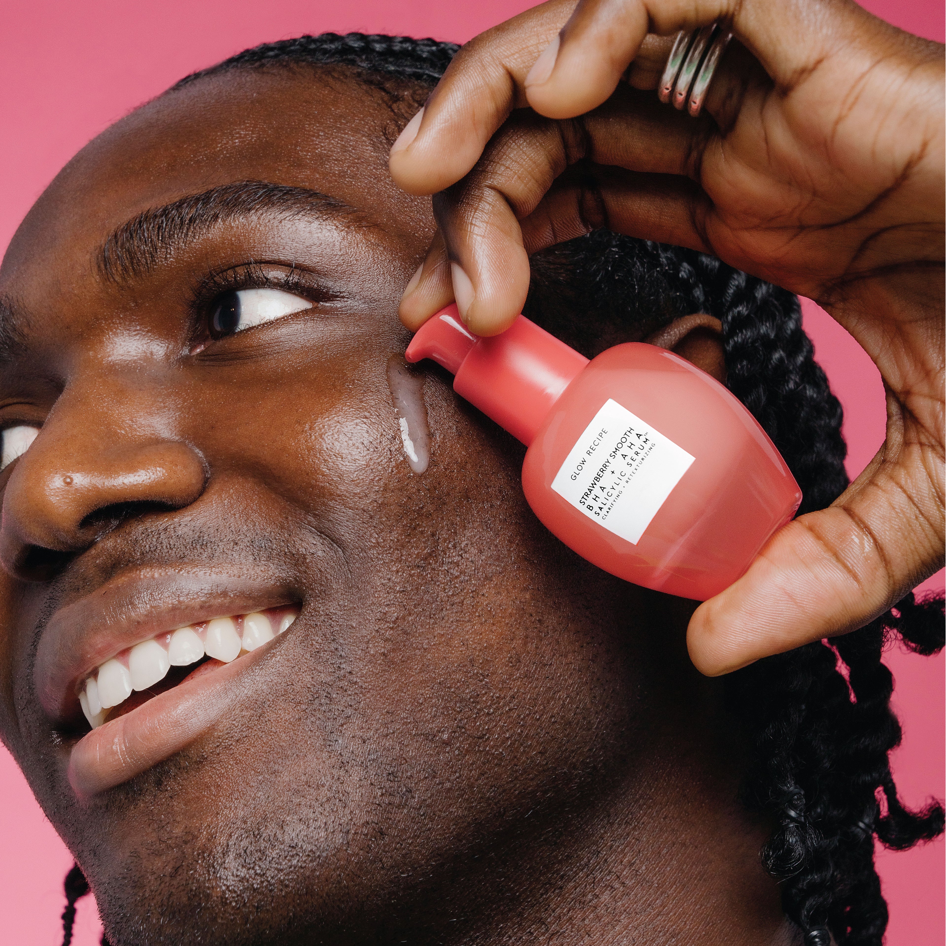 Glow Recipe Strawberry Smooth BHA+AHA Salicylic Serum bottle shown to highlight its silky, fast-absorbing gel texture.