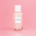 Mini Watermelon Glow PHA + BHA Pore-Tight Toner bottle from the Real Glass Skin Kit shown on a pink background.