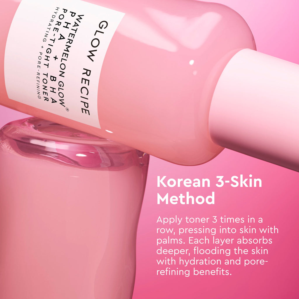Pink skincare bottle with text on a pink background
