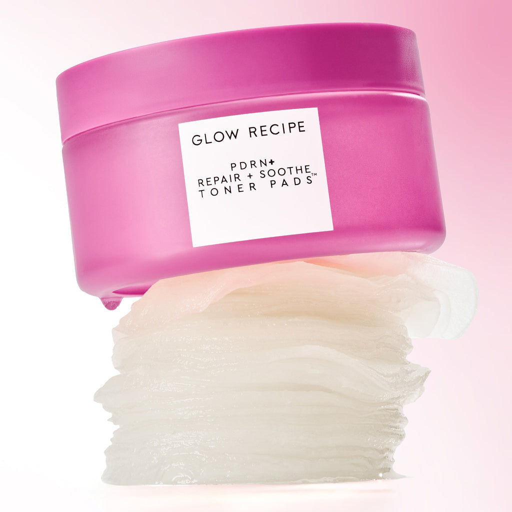 Glow Recipe PDRN+ Repair + Soothe Toner Pads jar of 60 dual-textured pads shown on a soft pink background.
