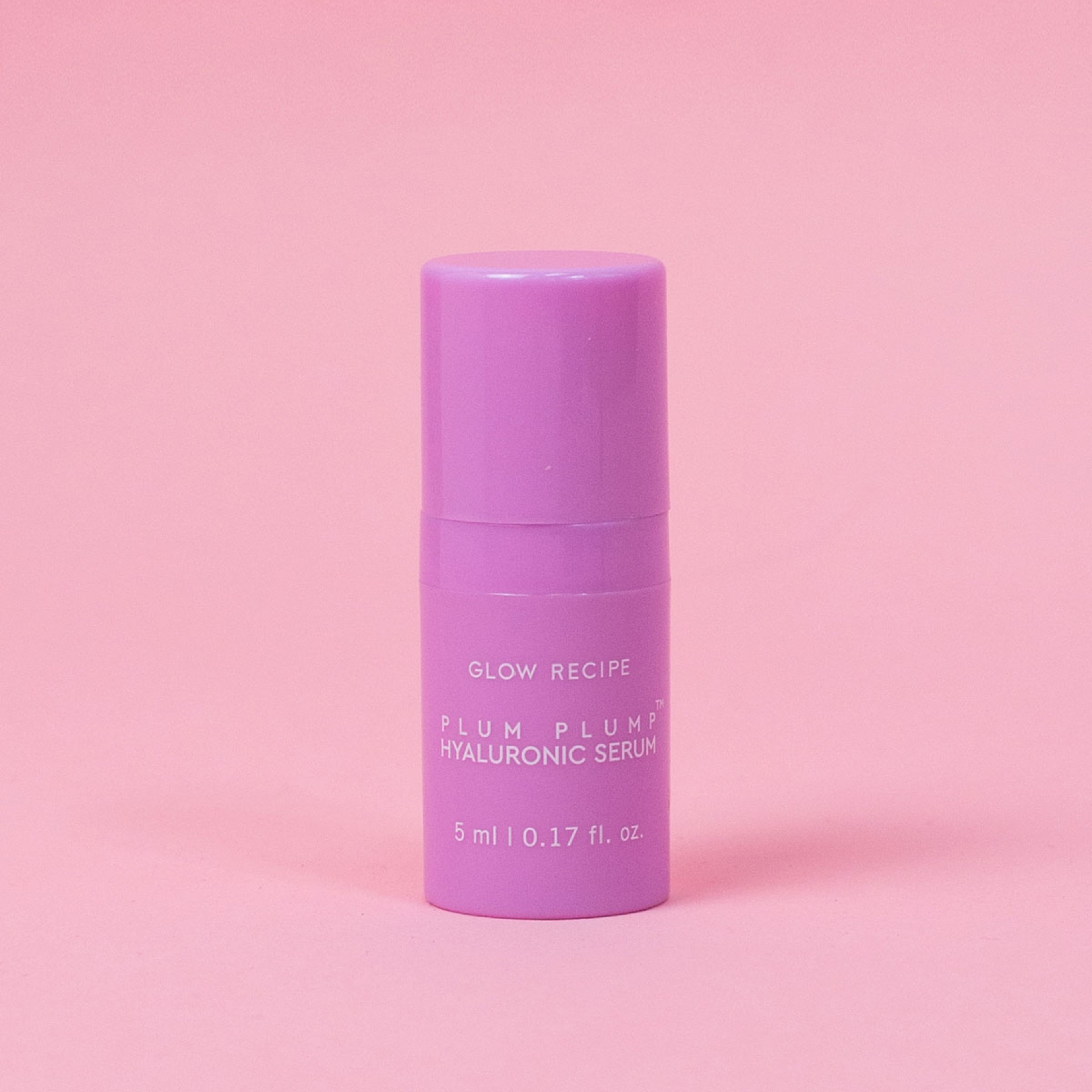 Purple serum bottle with 'Glow Recipe' on a pink background